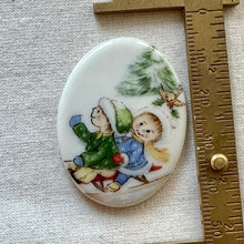 Load image into Gallery viewer, Holiday Sledding Oval Cabochon
